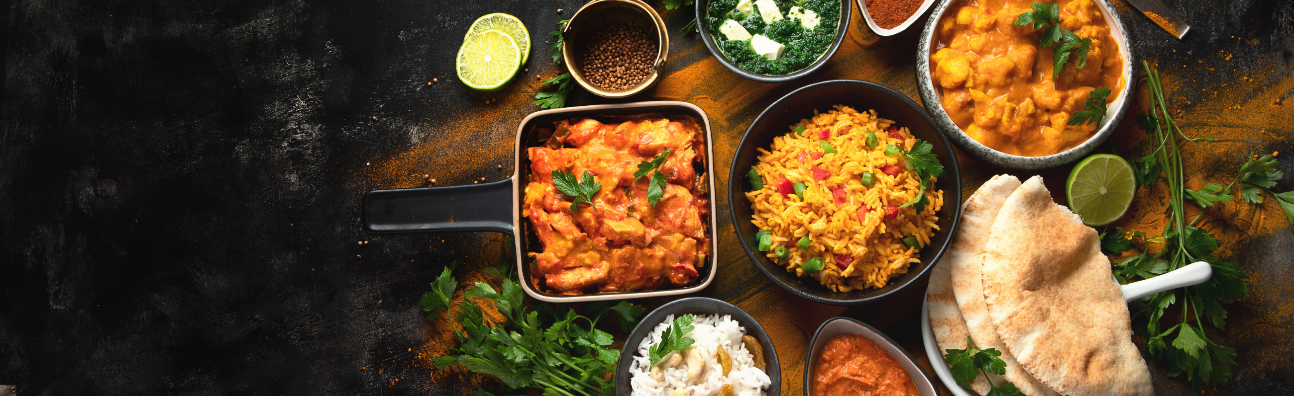 A couple of people that are holding some food.